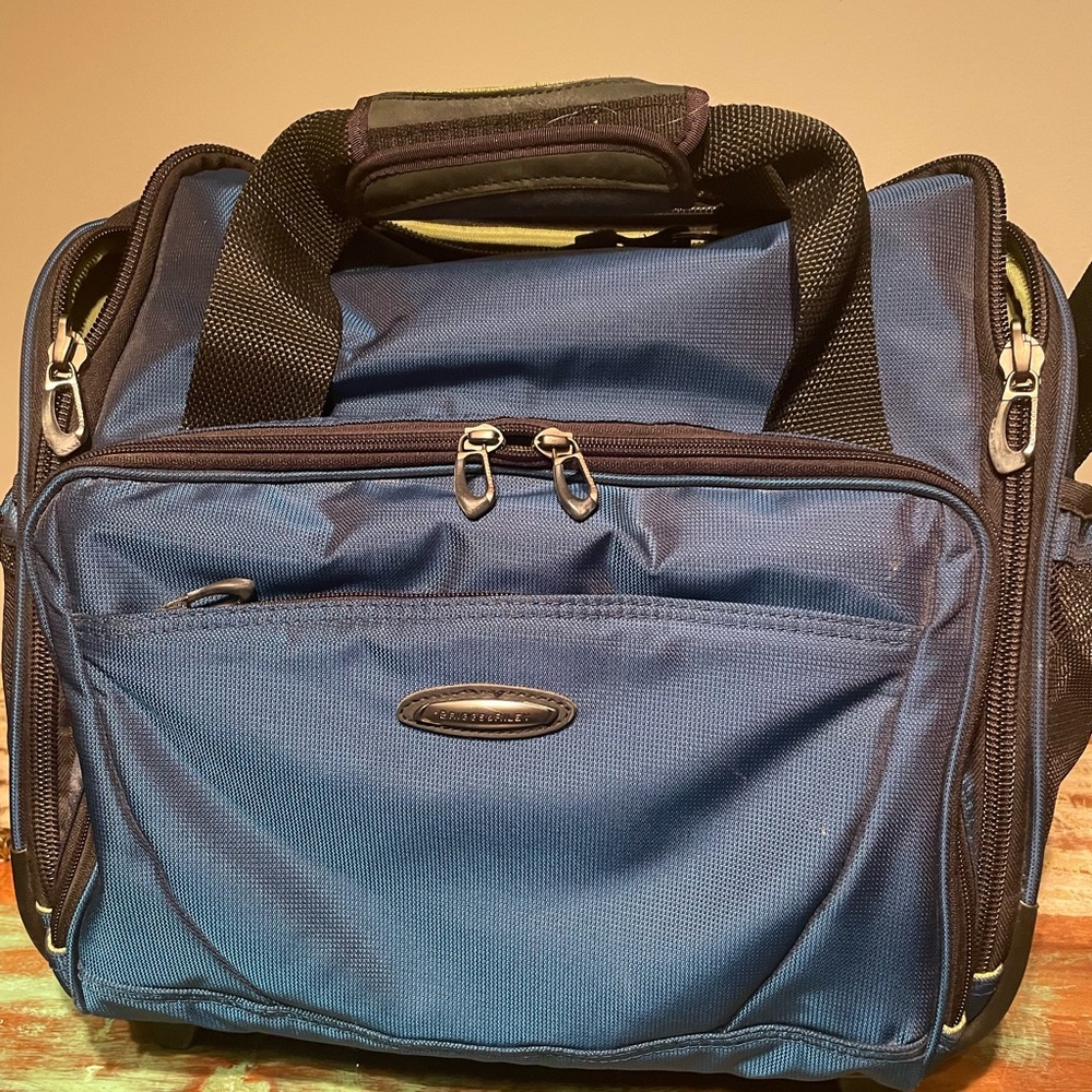 Briggs and Riley wheeled briefcase / laptop luggagege
15” x 10” x14”